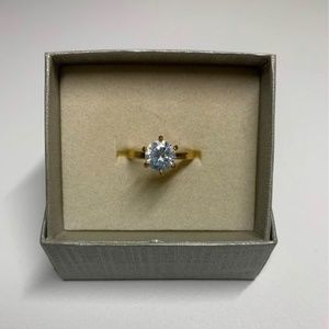 Solitaire White Sapphire Ring